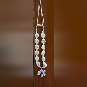 White Shell Necklace with Purple Flower Pendant